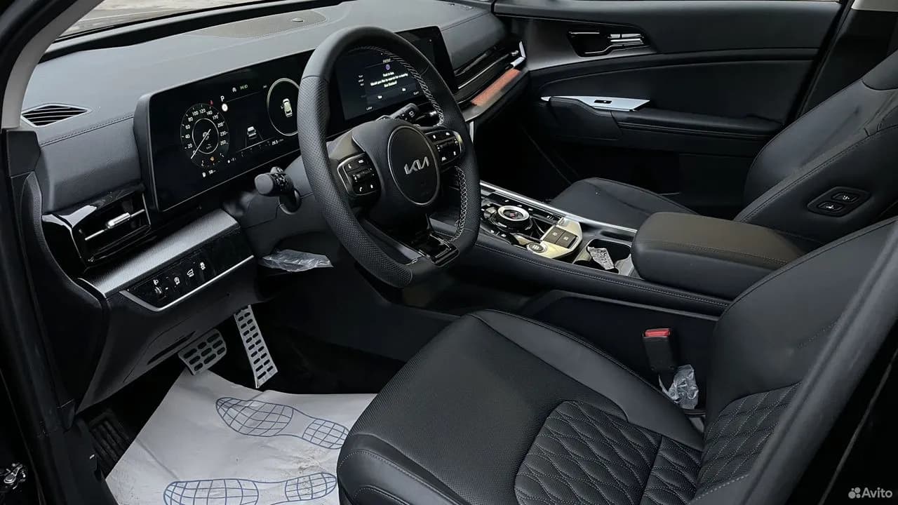 Kia Sportage — фото 12