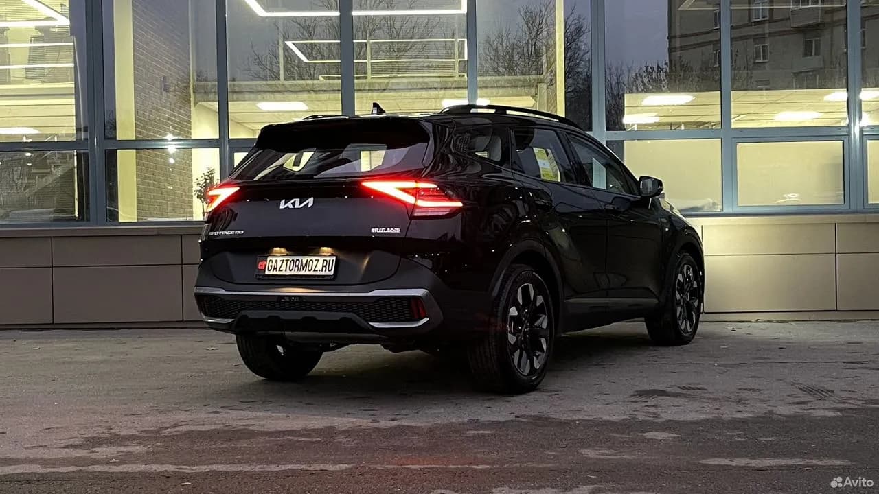 Kia Sportage — фото 7