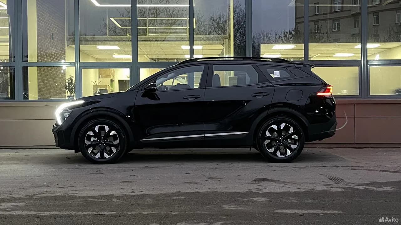 Kia Sportage — фото 8