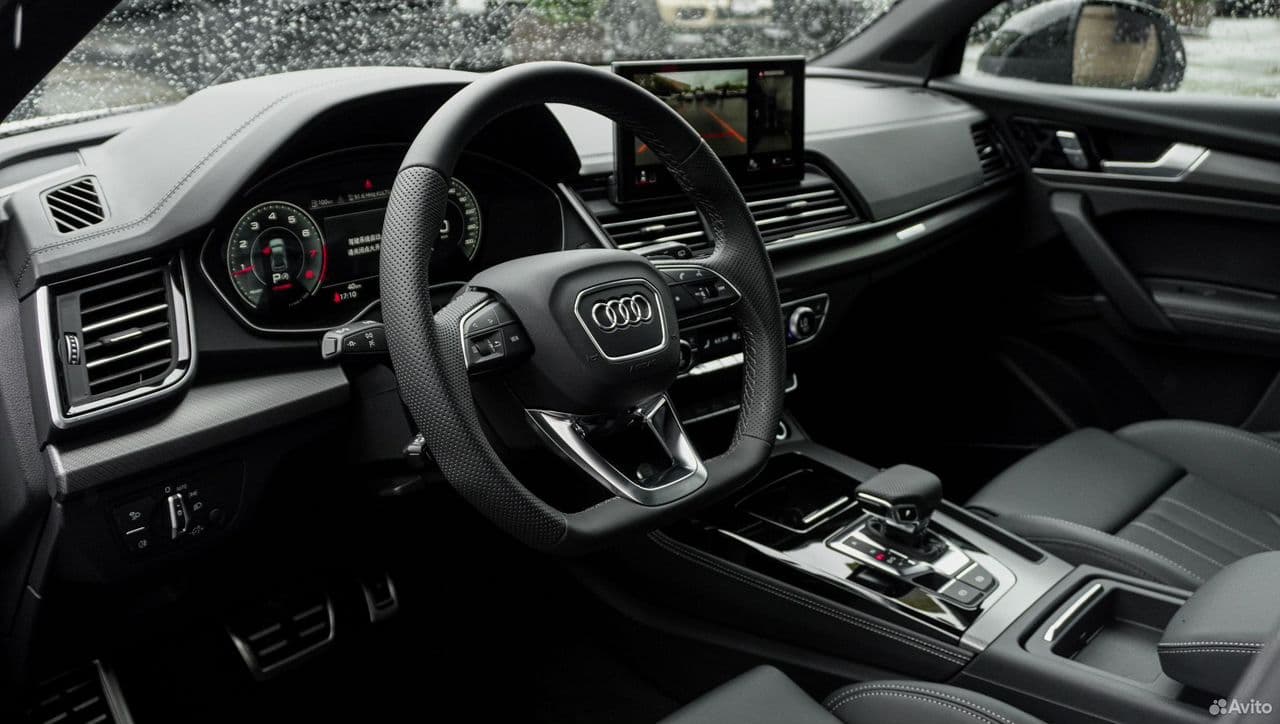 Audi Q5L — фото 13