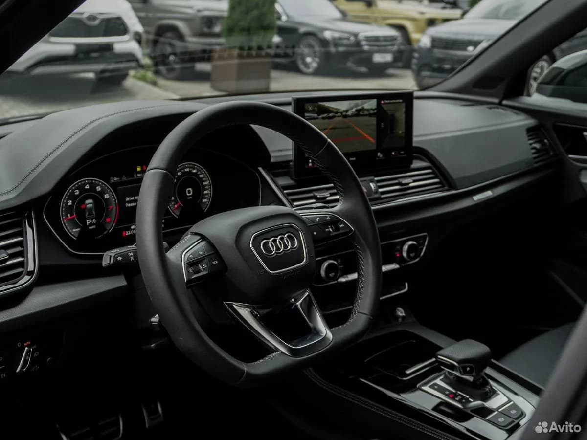 Audi Q5L — фото 14