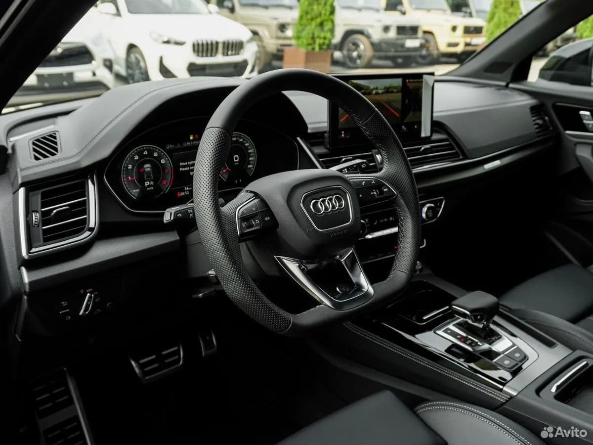 Audi Q5L — фото 13