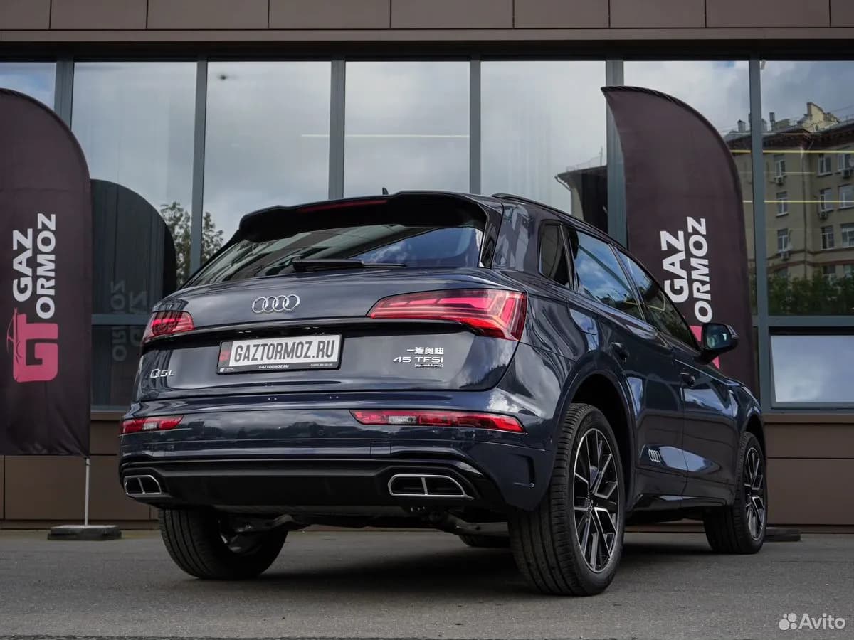Audi Q5L — фото 8