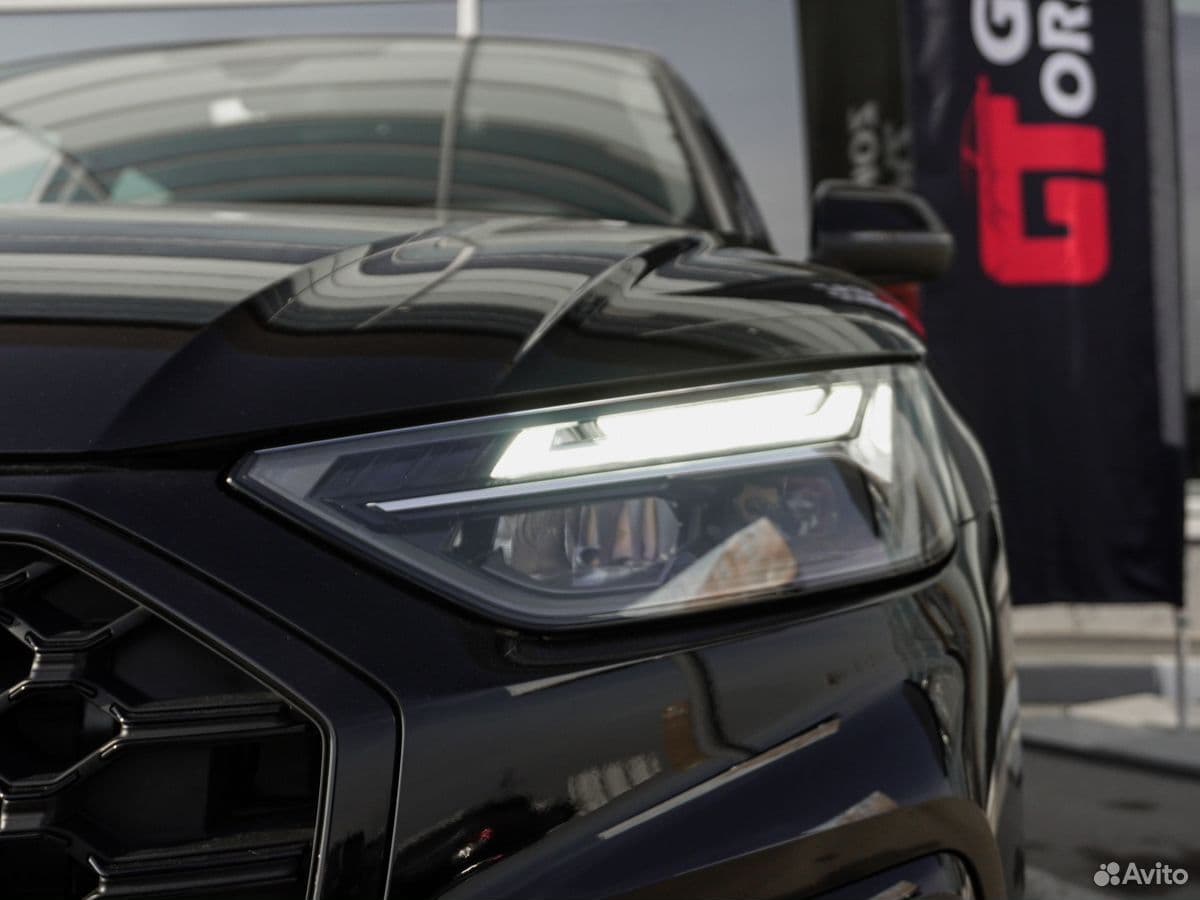 Audi Q5L — фото 10