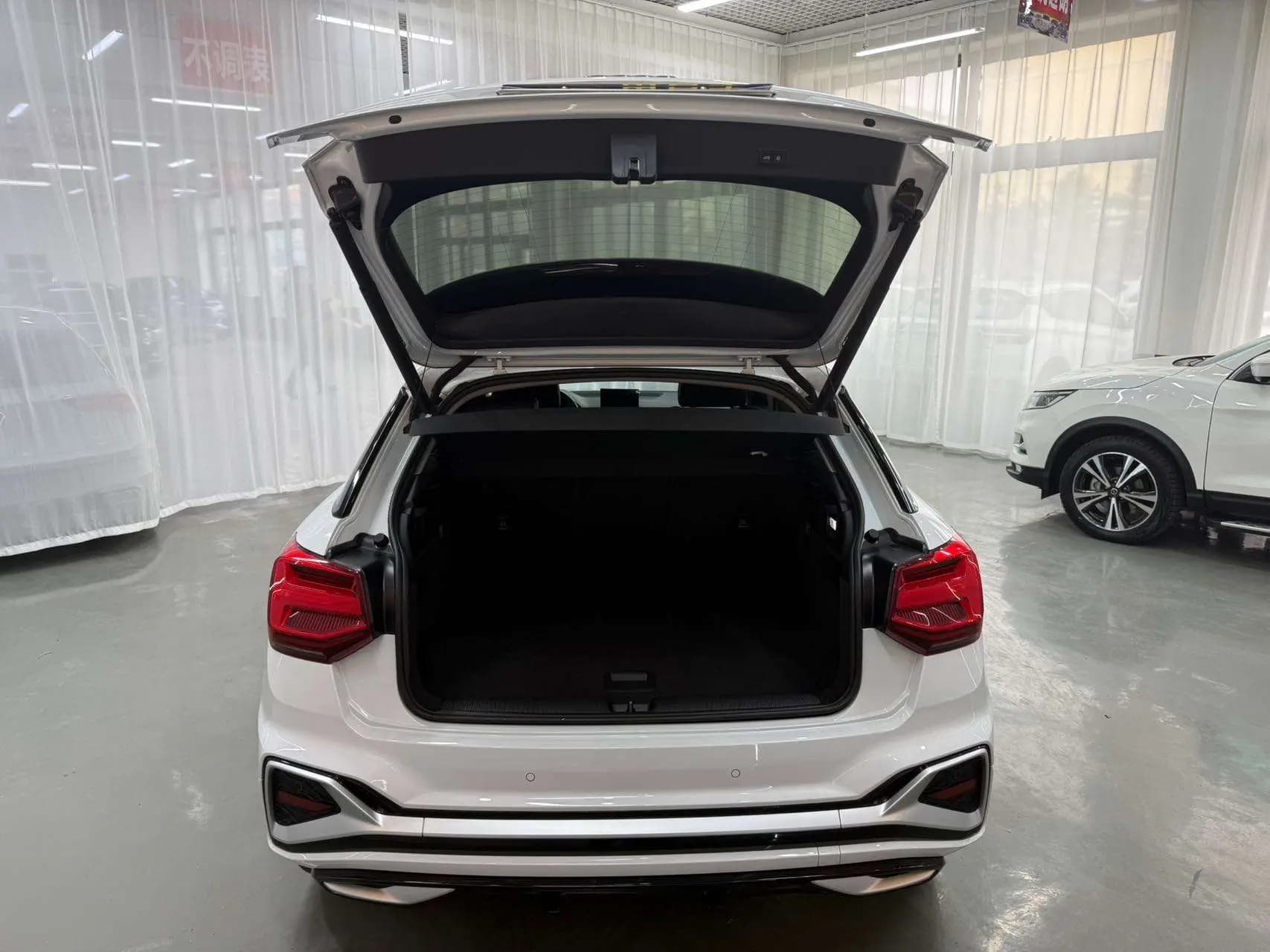 Audi Q2L 2022 г. 63009 км. — фото 15
